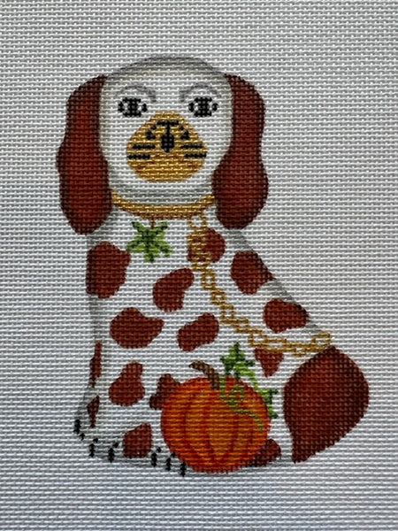 OM-321  Mini Staffordshire Dog Ornament - white & brown with pumpkin